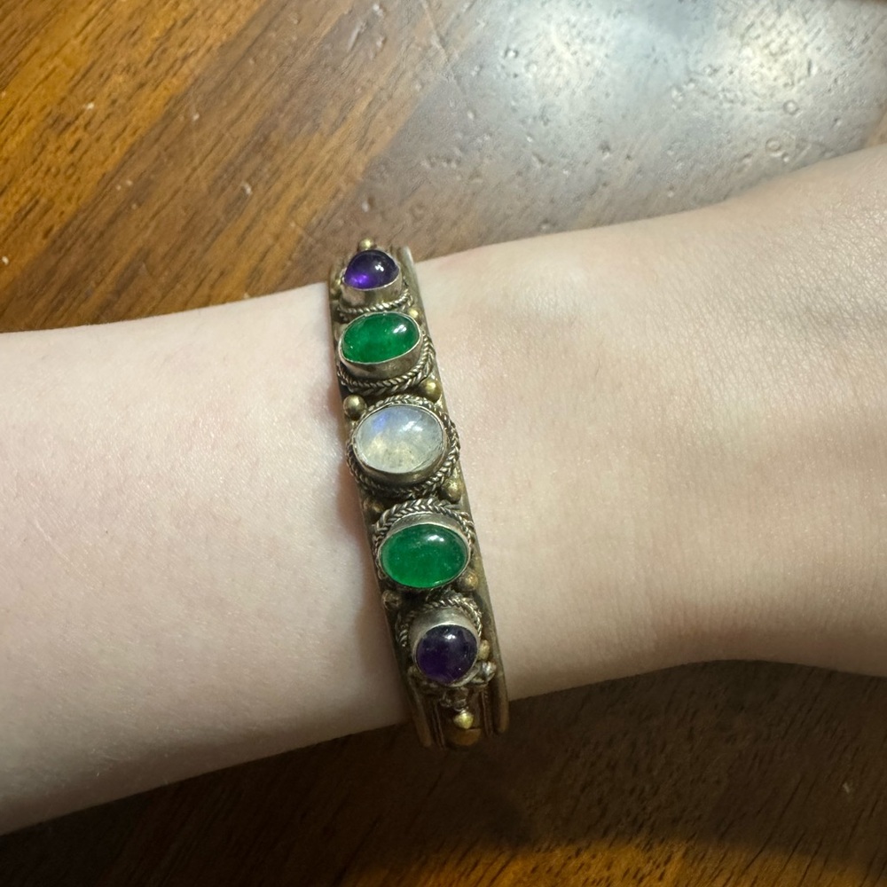 Elegant Gold Bracelet with Green and Purple Stones